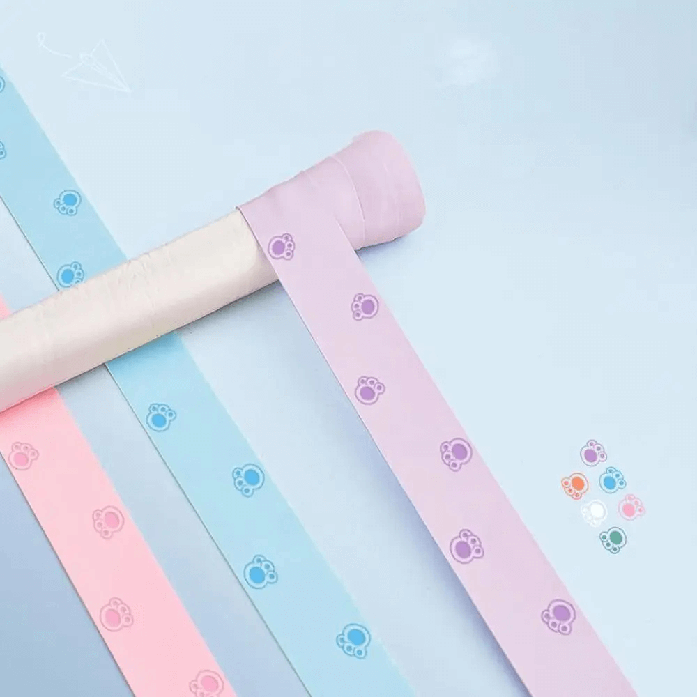 Colorful Paw Print Sports Overgrip Tape for Racket Handles - SF3460 in pink, blue, and purple for tennis and racket sports.